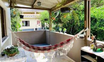 Imagem 5: Casas em um ótimo terreno para construir salas comerciais ou qualquer tipo de comércio em