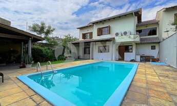 Imagem 3: Casa de 3 quartos com 2 vagas à venda no bairro Jardim Itú em Porto Alegre