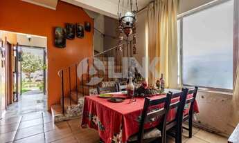 Imagem 2: Casa de 4 quartos com 3 vagas à venda no bairro São João em Porto Alegre