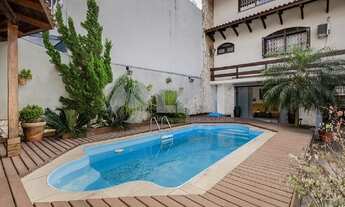 Imagem 4: Imóvel Exclusivo: Casa de 3 Quartos com 3 Suítes e 8 Vagas no Partenon, Porto Alegre-RS!