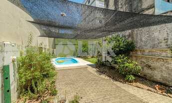 Imagem 2: Casa de 3 quartos com 4 vagas à venda no bairro Menino Deus em Porto Alegre: Charme e Conf