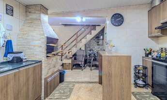 Imagem 7: Casa estilo sobrado com 5 quartos e 5 vagas à venda no bairro Sarandi em Porto Alegre