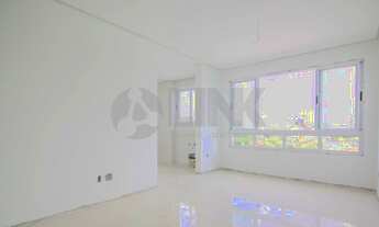 Imagem 2: Apartamento de 1 dormitório sendo 1 suíte à venda com 2 vagas de garagem em Porto Alegre