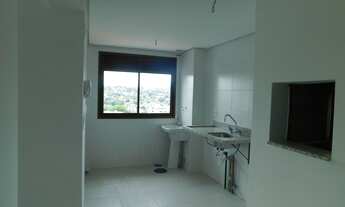 Imagem 4: Apartamento com 2 dormitórios sendo 1 suíte, living para 2 ambientes, cozinha americana co