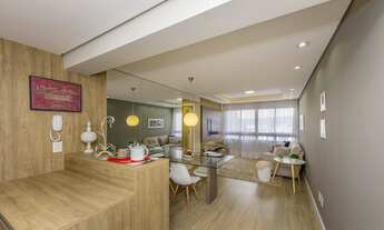 Imagem 2: Apartamento com 2 dormitórios sendo 1 suíte, living para 2 ambientes, cozinha americana co