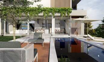 Imagem 2: Casa em condomínio de 3 dormitórios sendo 3 suítes com 2 vagas de garagem à venda no bairr