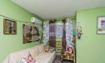 Imagem 3: Apartamento de 2 dormitórios à venda com 1 vaga de garagem em Porto Alegre, no bairro Glór