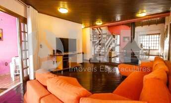 Imagem 3: Casa de 4 dormitórios sendo 1 suíte à venda com 4 vagas de garagem em Porto Alegre, no bai