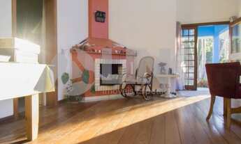 Imagem 2: Casa de 3 dormitórios sendo 1 suíte à venda com 1 vaga de garagem em Porto Alegre, no bair