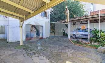 Imagem 6: Casa de 4 dormitórios sendo 1 suíte à venda com 4 vagas de garagem em Porto Alegre, no bai