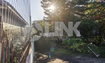 Imagem 4: Terreno de 810m² à venda com 3 casas em Porto Alegre no bairro Jardim Floresta