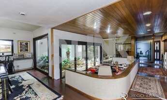 Imagem 3: Casa de 5 dormitórios sendo 1 suíte com 6 vagas de garagem à venda no bairro Jardim Lindói