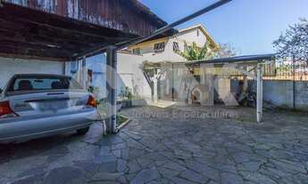 Imagem 4: Casa de 4 dormitórios sendo 1 suíte à venda com 4 vagas de garagem em Porto Alegre, no bai