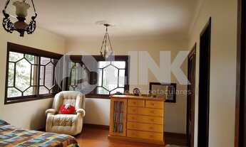 Imagem 5: Casa de 4 dormitórios sendo 3 suítes à venda com 2 vagas de garagem em Porto Alegre, no ba