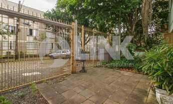 Imagem 2: Casa de 4 dormitórios sendo 2 suítes à venda com 4 vagas de garagem em Porto Alegre, no ba