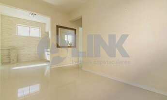 Imagem 3: Apartamento de 2 dormitórios à venda com 1 vaga de garagem em Porto Alegre, no bairro Jard