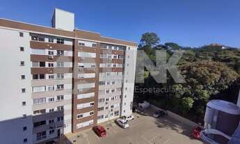 Imagem 2: Apartamento de 2 dormitórios à venda com 1 vaga de garagem em Porto Alegre, no bairro Vila