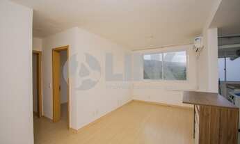 Imagem 2: Apartamento 2 dormitórios sendo 1 suíte com 1 vaga de garagem em Porto Alegre, no bairro J