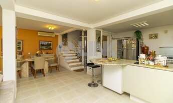 Imagem 2: Casa em condomínio de 4 dormitórios sendo 2 suítes com 4 vagas de garagem à venda no bairr