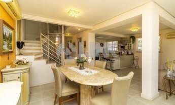 Imagem 3: Casa em condomínio de 4 dormitórios sendo 2 suítes com 4 vagas de garagem à venda no bairr