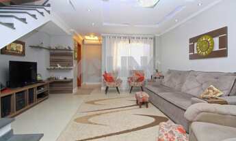 Imagem 2: Casa 3 dormitórios com 2 vagas de garagem à venda no bairro Jardim Itú em Porto Alegre pró