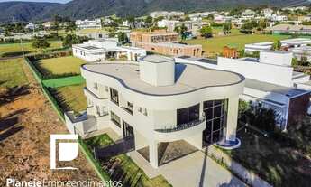 Imagem 5: CASA A VENDA NO CONDOMÍNIO RESERVA PORTA JAPY, ARQUITETURA MODERNA EM UM CONDOMÍNIO GOLF C