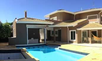 Imagem 2: Luxuosa Casa no Condomínio Alphaville 1 Campinas para Locação - 5 Suítes, Piscina, Sauna e