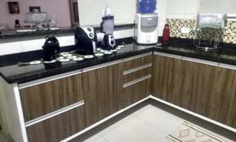 Imagem 5: Casa sofisticada com energia solar e espaço gourmet no Condomínio Portal Ville Flamboyant