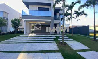 Imagem 2: 4 suítes: Cada quarto possui seu próprio banheiro, proporcionando privacidade e comodidade