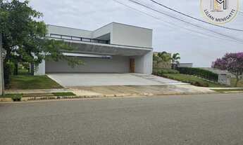 Imagem 4: Sobrado com 5 suites, sendo 1 no térreo. Mini campo, piscina. Condomínio Terras de Caxambu