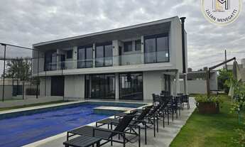 Imagem 5: Sobrado com 5 suites, sendo 1 no térreo. Mini campo, piscina. Condomínio Terras de Caxambu