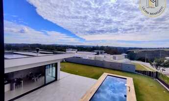 Imagem 3: Sobrado com 4 suites, sendo 1 no térreo. Mini campo, piscina. Condomínio Terras de Caxambu
