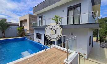 Imagem 4: Sobrado com 4 dormitórios, escritório, área gourmet e piscina. Em frente ao clube. Condomi