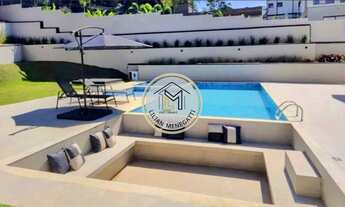 Imagem 3: Casa com piscina aquecida. 4 quartos, suítes sendo todas com closet .Escritório. Condomíni