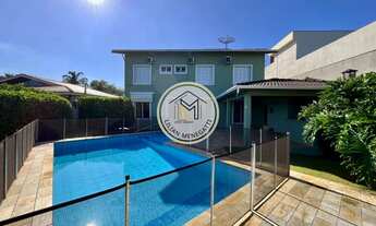 Imagem 1: Casa em Condomínio com 4 quartos, suítes com closet. Churrasqueira. Piscina. 4 vagas. Hidr