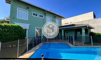 Imagem 3: Casa em Condomínio com 4 quartos, suítes com closet. Churrasqueira. Piscina. 4 vagas. Hidr