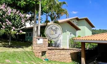 Imagem 2: Casa em Condomínio com 4 quartos, suítes com closet. Churrasqueira. Piscina. 4 vagas. Hidr