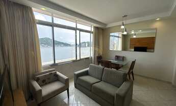 Imagem 3: Apartamento 1 quarto com suíte, sala com vista mar, cozinha americana, banheiro social e á