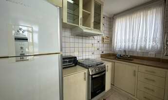 Imagem 7: Apartamento 1 quarto com suíte, sala com vista mar, cozinha americana, banheiro social e á