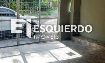 Imagem 2: Casa dois dormitórios sendo uma suíte, 2 vagas de garagem cobertas