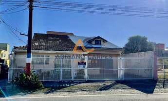 Imagem 1: Vende-se casa com 4 quartos no centro, beira mar em Navegantes SC - Adriano Carpes Imóveis