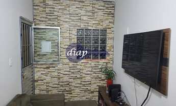 Imagem 2: Lindo imóvel com 3 casa. A primeira casa é um sobrado com 3 dormitórios, sendo 1 suítes, l