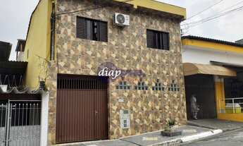 Imagem 1: Lindo imóvel com 3 casa. A primeira casa é um sobrado com 3 dormitórios, sendo 1 suítes, l