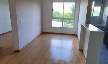 Imagem 4: Apartamento primeiro andar contendo 2 dormitórios, cozinha montada, elevador, sol da manhã