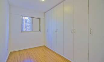 Imagem 7: Nesse apartamento, você tem um living com varanda, integrado à uma excelente cozinha ameri