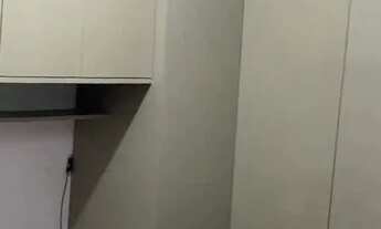 Imagem 3: Apartamento com dois dormitórios e varanda, uma vaga de garagem, móveis planejados da cozi