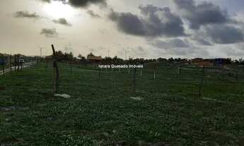 Imagem 2: Terreno plano vista mar no Morro do Chapéu com cerca e plantação!