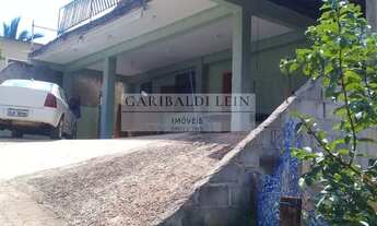 Imagem: 3 dormitórios, 2 banheiro, 4 vagas na garagem