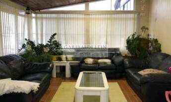 Imagem 2: 4 dormitórios, 1 suítes, 4 banheiro, 2 vagas na garagem, 240M² de Área Construída