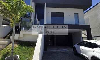 Imagem: 3 dormitórios, 1 suítes, 5 banheiro, 4